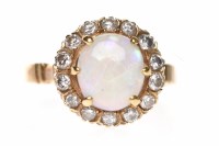 Lot 270 - OPAL AND DIAMOND CLUSTER RING set with a...