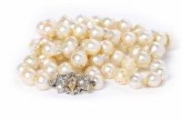 Lot 142 - PEARL NECKLACE formed by spherical and...