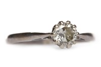 Lot 216 - DIAMOND SOLITAIRE RING the ten claw set round...