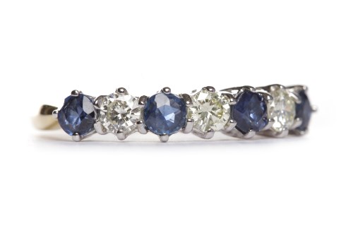 Lot 233 - SAPPHIRE AND DIAMOND SEVEN STONE RING set with...