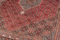 Lot 849 - HAMADAN BORDERED CARPET decorated with a large...