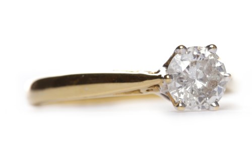Lot 242 - DIAMOND SOLITAIRE RING the six claw set round...