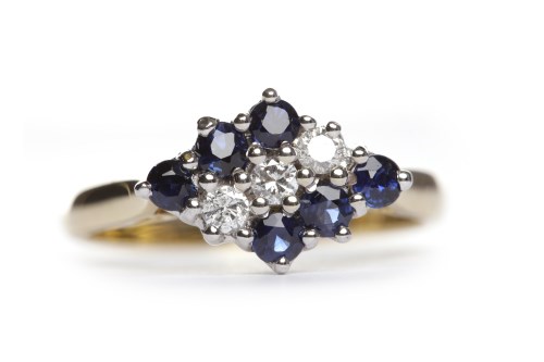 Lot 268 - SAPPHIRE AND DIAMOND DRESS RING the central...