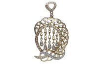 Lot 296 - GEM SET PENDANT openwork and set with round...