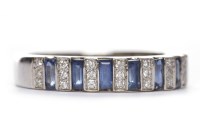 Lot 305 - SAPPHIRE AND DIAMOND RING with baguette cut...