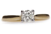 Lot 307 - DIAMOND SOLITAIRE RING the four claw set round...