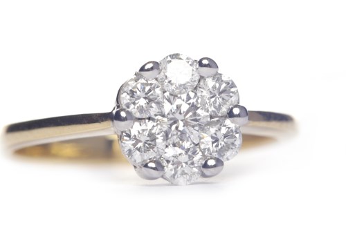 Lot 308 - DIAMOND CLUSTER RING set with round brilliant...