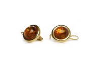 Lot 349 - PAIR OF AMBER EARRINGS each set with a round...