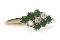 Lot 357 - EMERALD AND DIAMOND RING set with three...