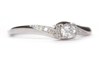 Lot 358 - DIAMOND SOLITAIRE RING the four claw set round...