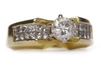 Lot 395 - DIAMOND SOLITAIRE RING the six claw set round...