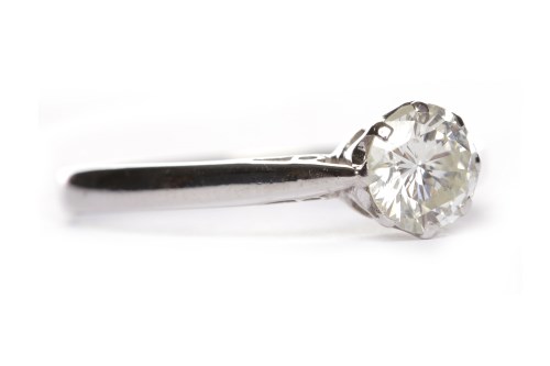 Lot 396 - DIAMOND SOLITAIRE RING the eight claw set...
