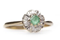Lot 408 - EMERALD AND DIAMOND CLUSTER RING the central...