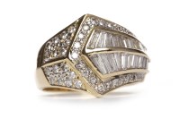 Lot 452 - DIAMOND CLUSTER RING the broad geometric band...
