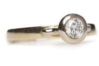 Lot 454 - DIAMOND SOLITAIRE RING the collet set round...