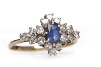 Lot 497 - CREATED SAPPHIRE AND DIAMOND RING the oval...