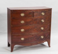 Lot 898 - REGENCY MAHOGANY BOW-FRONT CHEST of two short...