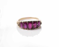 Lot 1827 - VICTORIAN RUBY FIVE STONE RING set with...