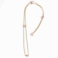 Lot 1875 - BEADED CHAIN NECKLACE the chain interspersed...