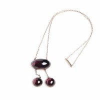 Lot 1877 - EARLY TWENTIETH CENTURY RED GLASS NECKLACE...