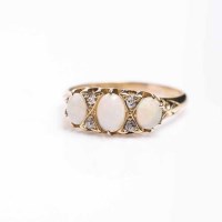 Lot 1902 - VICTORIAN OPAL AND DIAMOND RING set with three...