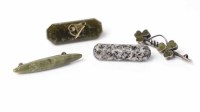 Lot 1949 - FOUR HARDSTONE BROOCHES comprising of a clover...
