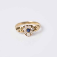 Lot 1950 - HEART SHAPED SAPPHIRE AND PEARL RING with a...