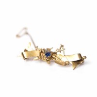 Lot 1952 - SAPPHIRE SET GOLD MINING BROOCH designed with...