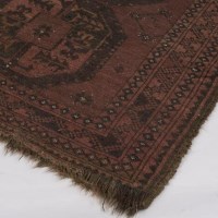 Lot 918 - BOKHARA BORDERED RUG decorated with three...