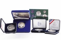Lot 195 - LOT OF CASED SILVER COINS comprising of an...