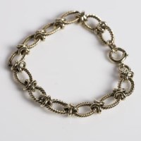Lot 1678 - NINE CARAT GOLD BRACELET rope design links, 19....