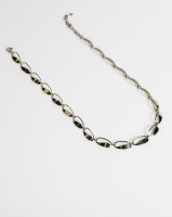 Lot 1684 - NINE CARAT GOLD NECKLACE WITH STYLISED LEAF...