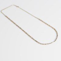 Lot 1687 - TEXTURED TRI COLOUR NINE CARAT GOLD NECKLACE...