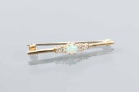 Lot 1692 - EIGHTEEN CARAT GOLD OPAL AND DIAMOND BAR...