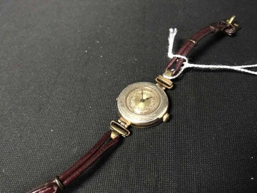 Lot 5 - LADIES GOLD WRISTWATCH with circular dial and...