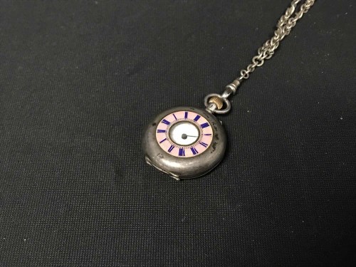 Lot 6 - VICTORIAN SILVER AND ENAMEL FOB WATCH on a chain