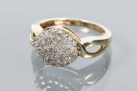 Lot 1699 - DIAMOND CLUSTER RING of scrolling form, set...