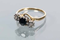 Lot 1702 - SAPPHIRE AND DIAMOND THREE STONE RING the...