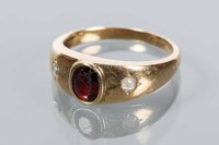 Lot 1704 - GENTLEMAN'S GARNET AND DIAMOND RING set with a...