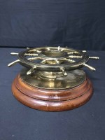 Lot 142 - BRASS WALL MOUNTED SHIPS WHEEL SURROUND FOR A...