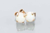 Lot 1718 - ROUND OPAL STUD EARRINGS each set with a round...