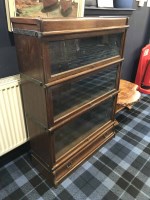 Lot 315 - OAK SECTIONAL BOOKCASE with three glazed and...