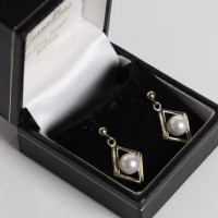 Lot 1742 - PAIR OF NINE CARAT GOLD AND PEARL DROP...