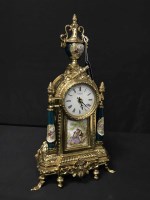 Lot 472 - REPRODUCTION CERAMIC AND BRASS CLOCK GARNITURE...