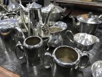 Lot 495 - LOT OF SILVER PLATED TEA SERVICES, TEA POTS...