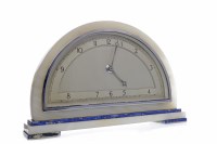 Lot 1047 - ART DECO MANTEL CLOCK the arched silvered dial...