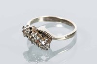 Lot 1755 - DIAMOND THREE STONE RING the three old cut...