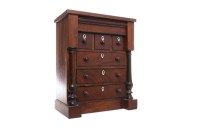 Lot 1247 - MAHOGANY MINIATURE CHEST in the form of a...