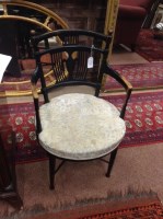Lot 1359 - EBONISED OPEN ELBOW CHAIR IN THE MANNER OF E.W....