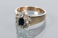 Lot 1769 - SAPPHIRE AND DIAMOND CLUSTER RING with a...